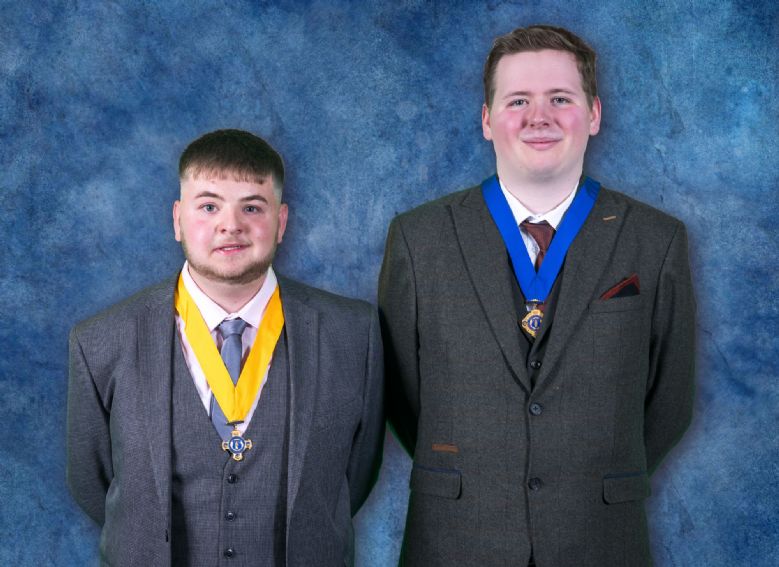 Image of Youth Deputy Mayor and Youth Mayor standing proud and smiling.